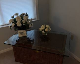 Wicker chest can also be a coffee table glass top