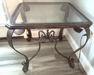 BUY IT NOW! $125.00.  Glass top table with iron base.  27" W x 27" D x 25" H.