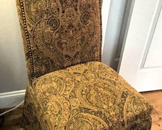 Upholstered chair.