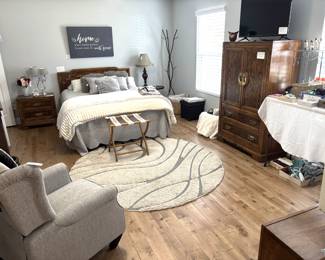 One of three bedrooms full of furnishings and decor.