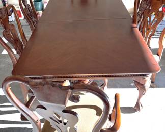 BUY IT NOW! $295.00  Great claw feet and legged table with six chairs (one captain/arm chair).  Vineyard Brand