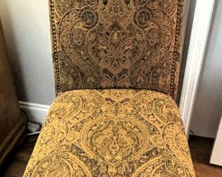 Upholstered chair.