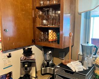 espresso maker, wine glasses