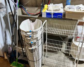 hampers, rags, metal shelf, mops, etc.