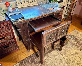 Wooden desk with pull out drawer and chair with three long deep storage drawers