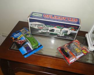 Hess trucks and a couple cars