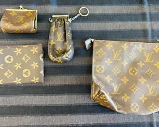 Close-up of Faux Louis Vuiton Purses - (Note: Purses are NOT kept at the house before or after sale hours)