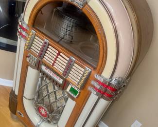 Wurlitzer Retro  very fun, lights up, eats your quarter, and looks very cool.