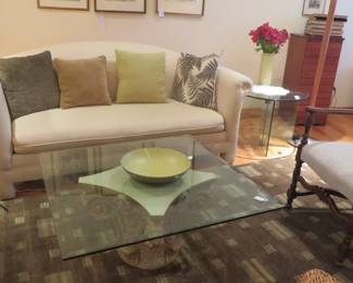 Unusual glass top table on cast terracotta base.