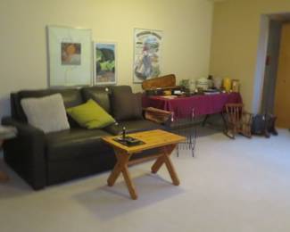 Like new excellent quality brown leather sofa bed.