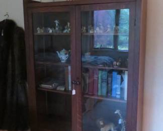Mission two door glass paneled cabinet.
