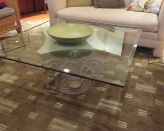 9x12 foot green Tufenkian wool rug with floating design. 