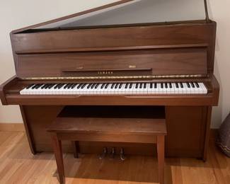 Mid-Century walnut Yamaha upright piano. Excellent condition.