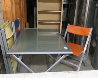 Very nice patio table and four chairs.