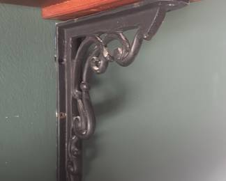 Pottery Barn - set of three wooden shelves with iron scrolled “L” brackets.
