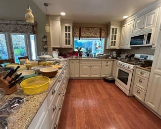 Amazing cooks kitchen filled with pots, pans, small appliances and much more.