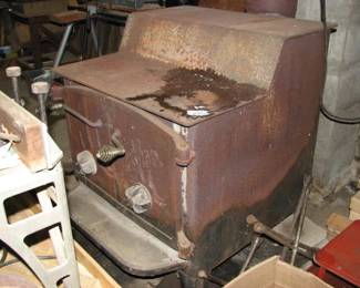 Fisher large wood stove, removal will need to be done at the end of the sale at your time and expense, you will need your own help. 