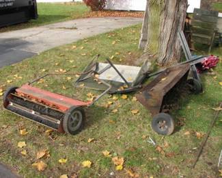 older leaf rake and aerator