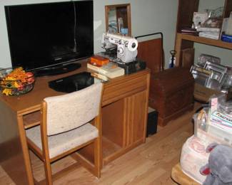 desk, sewing machine, tv, trunk