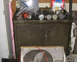 old metal shop bench, small engine starters grease guns