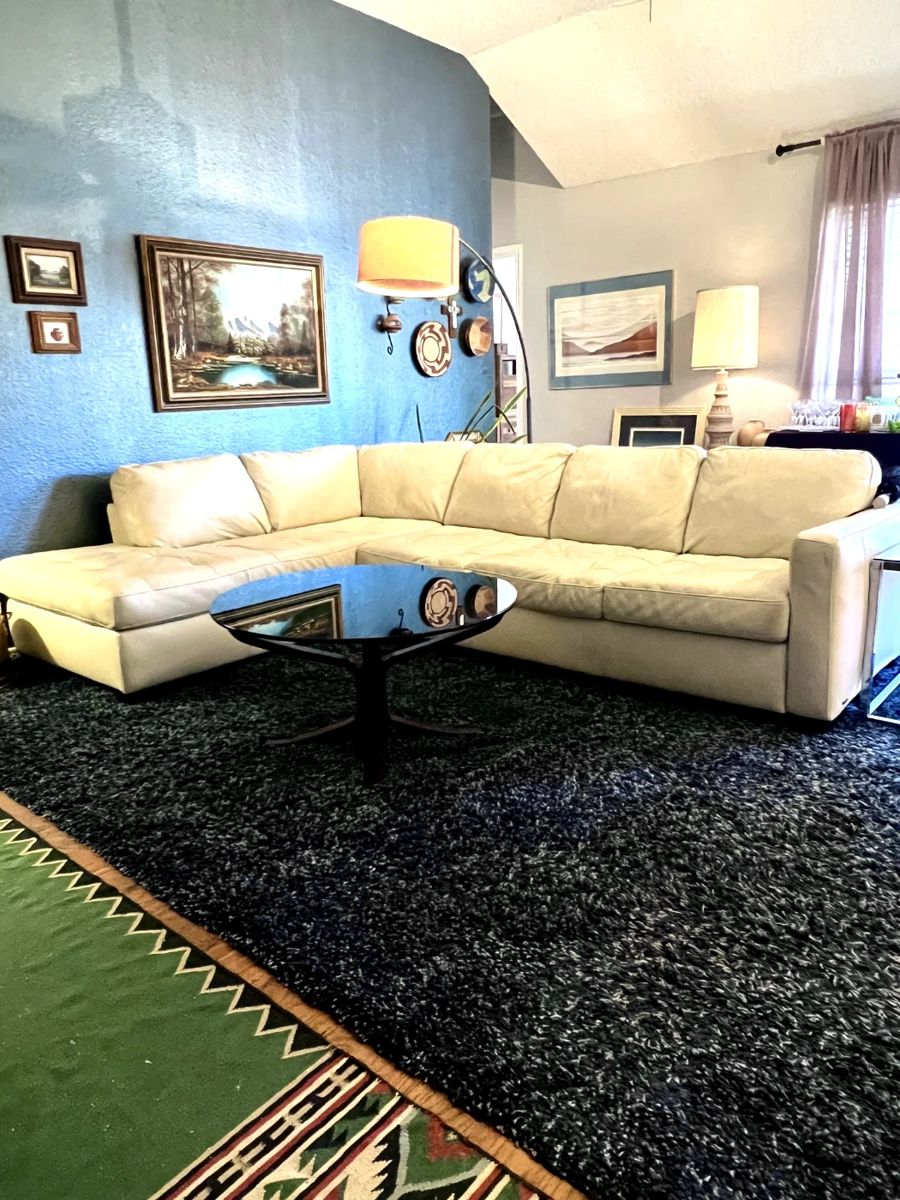 2 piece Natuzzi leather creme sectional