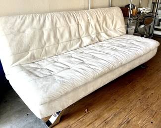 Suede Futon folds open 