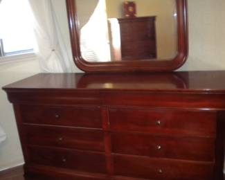 Matching triple dresser and mirror