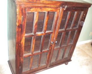 Primitive glass front curio