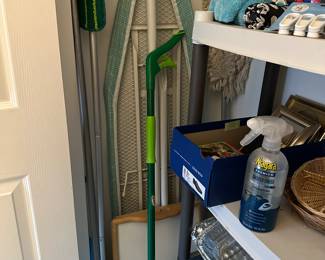 Ironing board, cleaning supplies