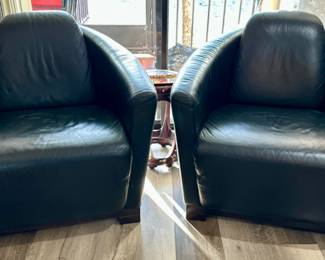 Black leather Calia lounge chairs