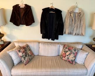 Selection of vintage fur coats in brown, black, and cream—excellent condition and timeless style.