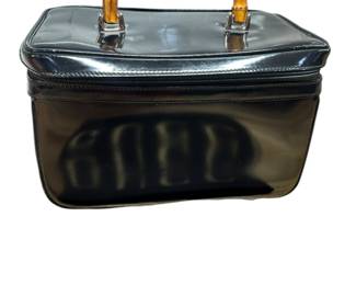 Vintage Gucci cosmetic bag with bamboo handle