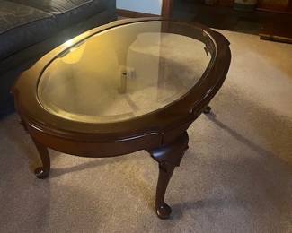 Solid cherry coffee table with glass top. Perfect condition.