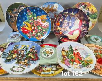 Avon Christmas collector plates with boxes