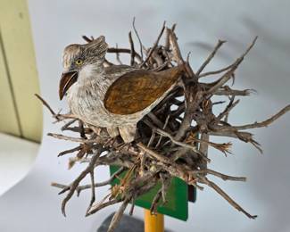 Carved bird on channel marker