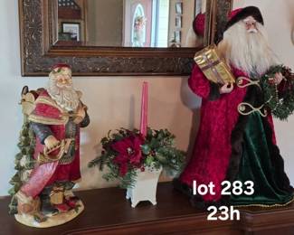 Large ceramic and cloth Santa figures