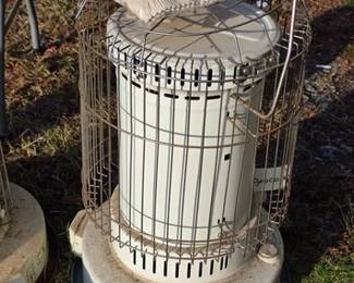 Kerosene heater, one of multiples in lot. Electric heaters and propane heaters, also