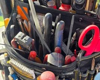 Tool bag caddy loaded with tools