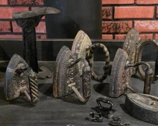 Antique cast irons and shoe form