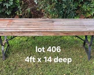 Wood slat top iron base bench