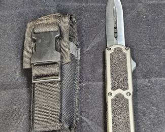 Clone of a Titan OTF Automatic Knife