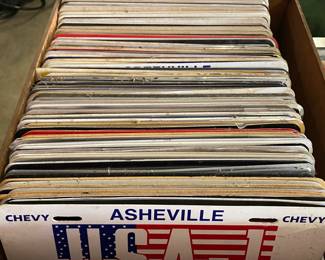 Lots of Vintage Car Dealership Tags