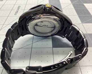 INVICTA 7114 AUTOMATIC THIS WATCH FEATURES POLISHED AND MATTE BLACK STRUCTURE AND DIAL WITH DATE WINDOW