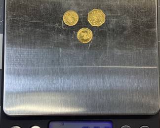 3 PC. 14KT GOLD COIN LOT THESE CALIFORNIA FRACTIONAL GOLD OCTAGON, ROUND AND, MINIATURE SOUTH AFRICAN KRUGERRAND COINS TESTS AT NO LESS THAN 58.5% (14K) GOLD, OCTAGON WEIGHING 0.35 GRAMS, ROUND AT 0.23 GRAMS, KRUGERRAND AT 0.14 GRAMS