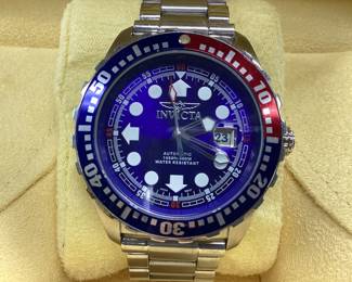 INVICTA 4107 PEPSI BEZEL THIS WATCH FEATURES AUTOMATIC MOVEMENT, DATE WINDOW, ARROW HOUR INDICATORS