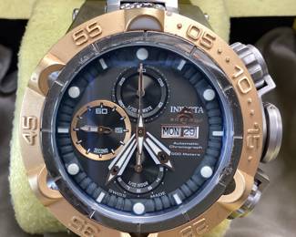 INVICTA 15491 SUBAQUA NOMA THIS AUTOMATIC WATCH FEATURES AN OVERSIZED STRUCTURE WITH CHRONOGRAPH DIAL MATTE GOLD DIAL AND ACCENTED BAND LINKS