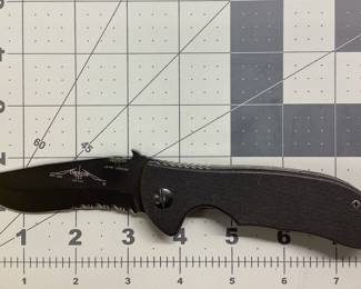 EMERSON KNIVES MINI COMMANDER THIS MINI COMMANDER BT LINERLOCK KNIFE IS 4 5/8 INCH IN THE CLOSED POSITION WITH 3 1/4 INCH BLADE. LIGHTLY USED WITH SOME SIGNS OF WEAR