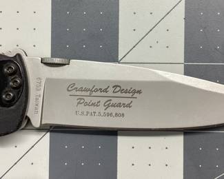 3 CRKT KNIVES LOT THIS LOT FEATURES AN OPERATION IRAQI FREEDOM DESERT CRUISER, POINT GUARD BY CRAWFORD DESIGN, M1 BY GREG LIGHTFOOT AT TACTICAL DESIGN