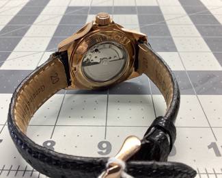 INVICTA 2964 WITH LEATHER BAND THIS WATCH HAS AUTOMATIC MOVEMENT INSIDE A GOLD BODY WITH MOTHER OF PEARL DIAL AND DATE WINDOW