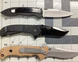 3 CRKT KNIVES LOT THIS LOT FEATURES AN OPERATION IRAQI FREEDOM DESERT CRUISER, POINT GUARD BY CRAWFORD DESIGN, M1 BY GREG LIGHTFOOT AT TACTICAL DESIGN
